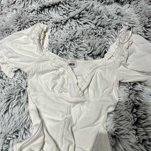 Lane 201 puff/ruffle sleeve white bodysuit